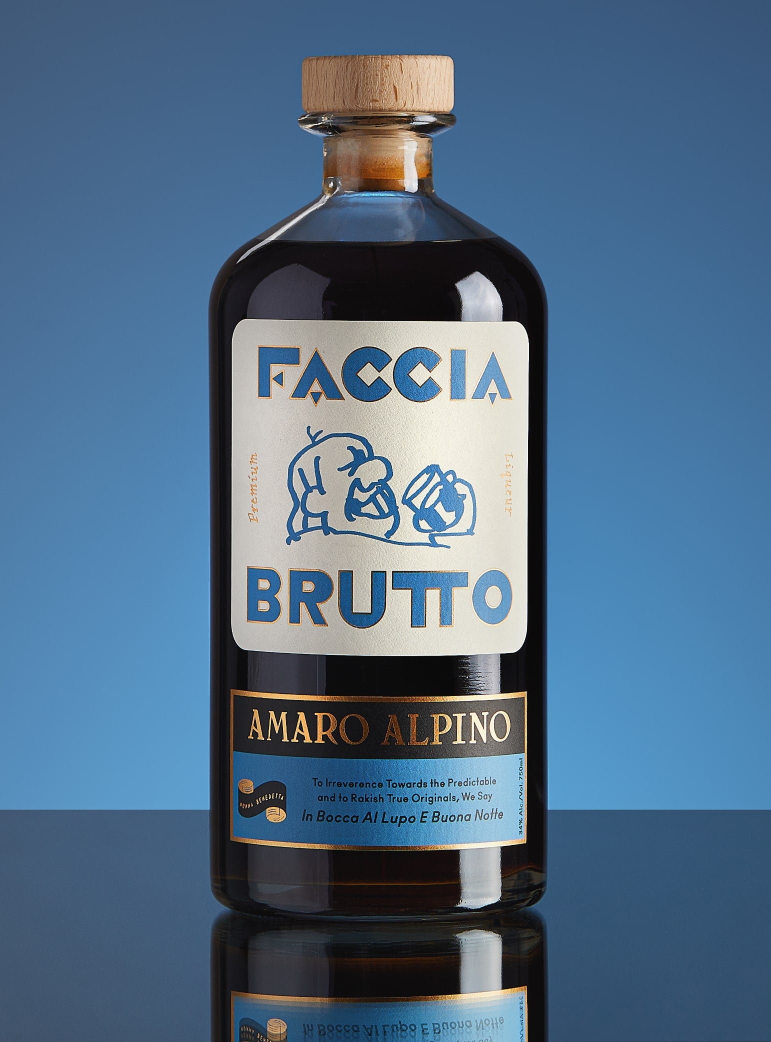 Cocktail glass with Faccia Brutto Amaro Alpino bottle in the background