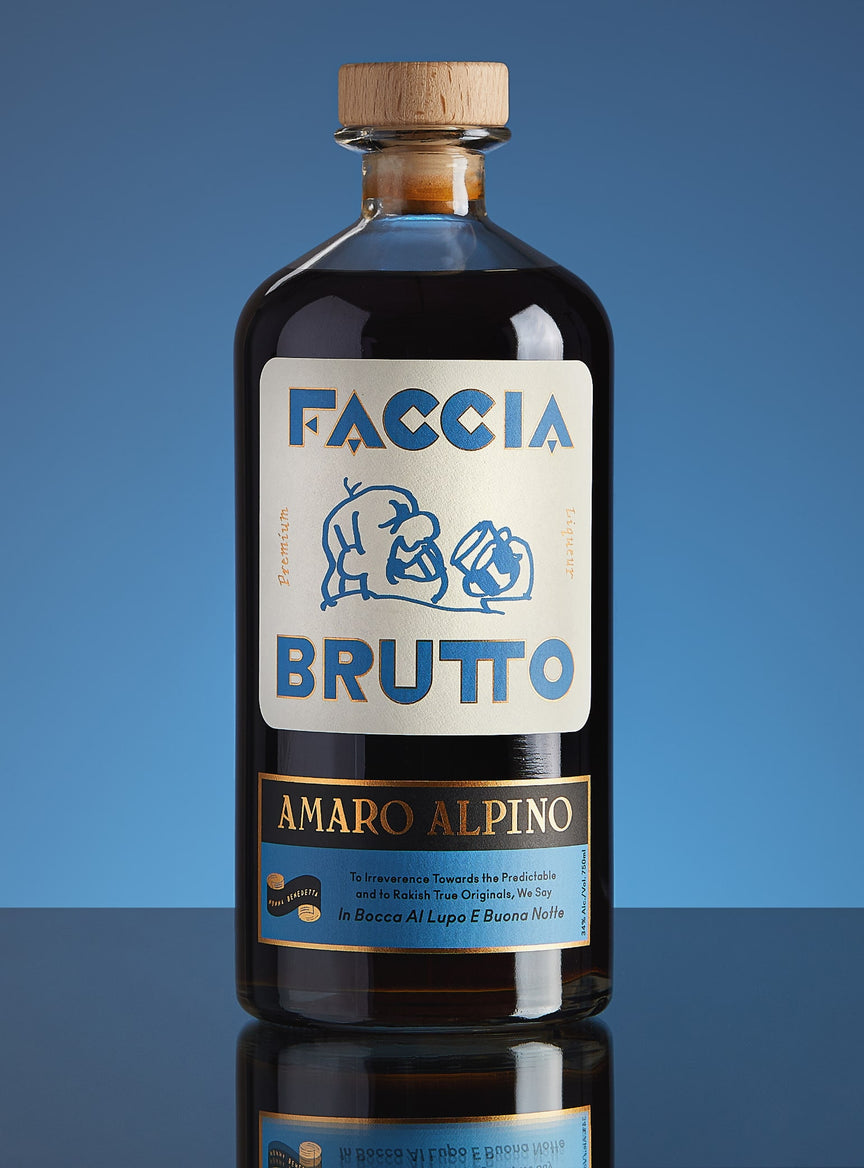 Front of Faccia Brutto Amaro Alpino bottle in front of blue background