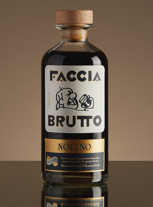 Front of Faccia Brutto Nocino bottle with brown background