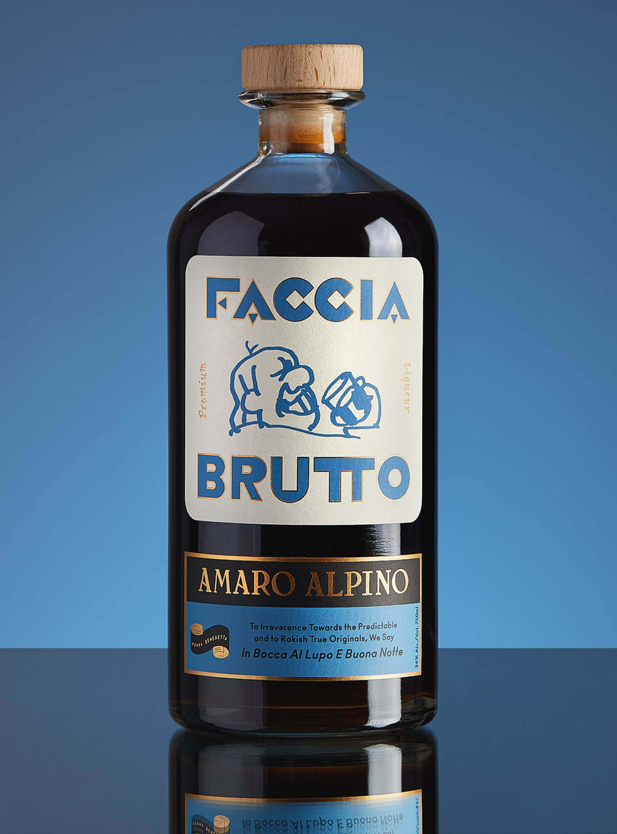 Faccia Brutto Amaro Alpino bottle with blue background